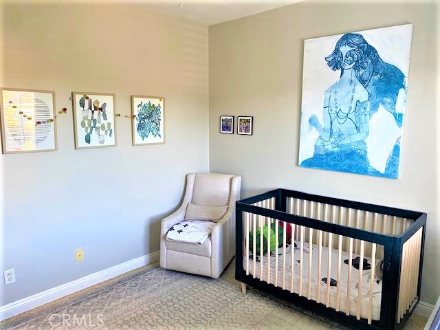 11 Corte Javier San Clemente, CA 92673 - Photo 25 of 30 a bedroom with a bed and wooden floor