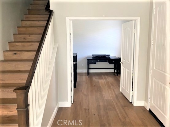 11 Corte Javier San Clemente, CA 92673 - Photo 4 of 30 a view of a hallway with wooden floor and staircase