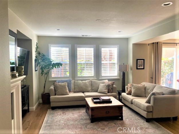 11 Corte Javier San Clemente, CA 92673 - Photo 6 of 30 a living room with furniture and a fireplace