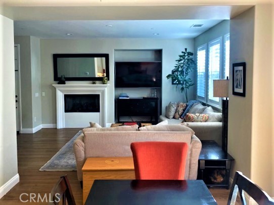11 Corte Javier San Clemente, CA 92673 - Photo 8 of 30 a living room with furniture a flat screen tv and a fireplace
