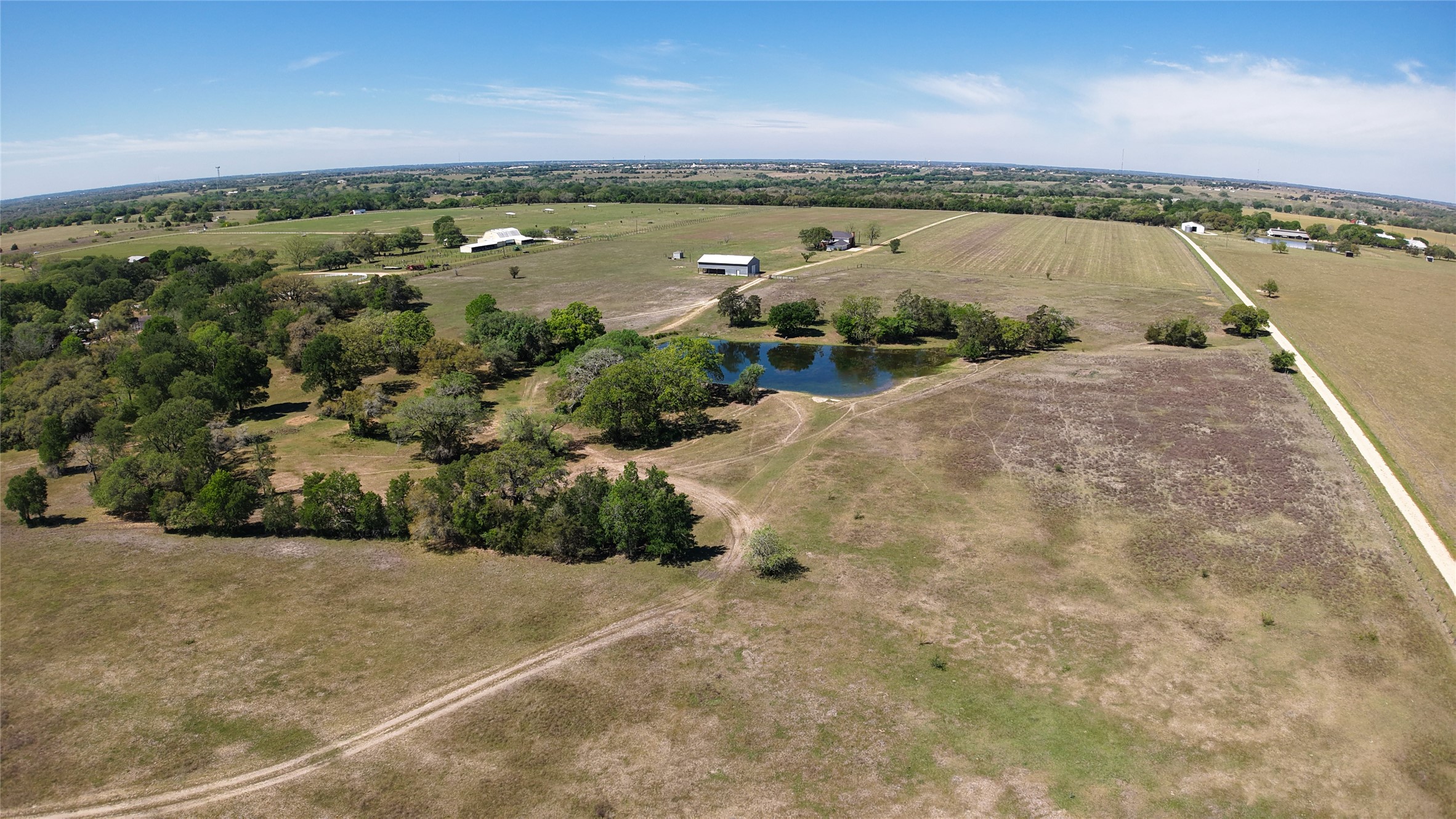 2745 Holub Road Schulenburg, TX 78956 - Photo 21 of 40 an aerial view of a house with a lake view