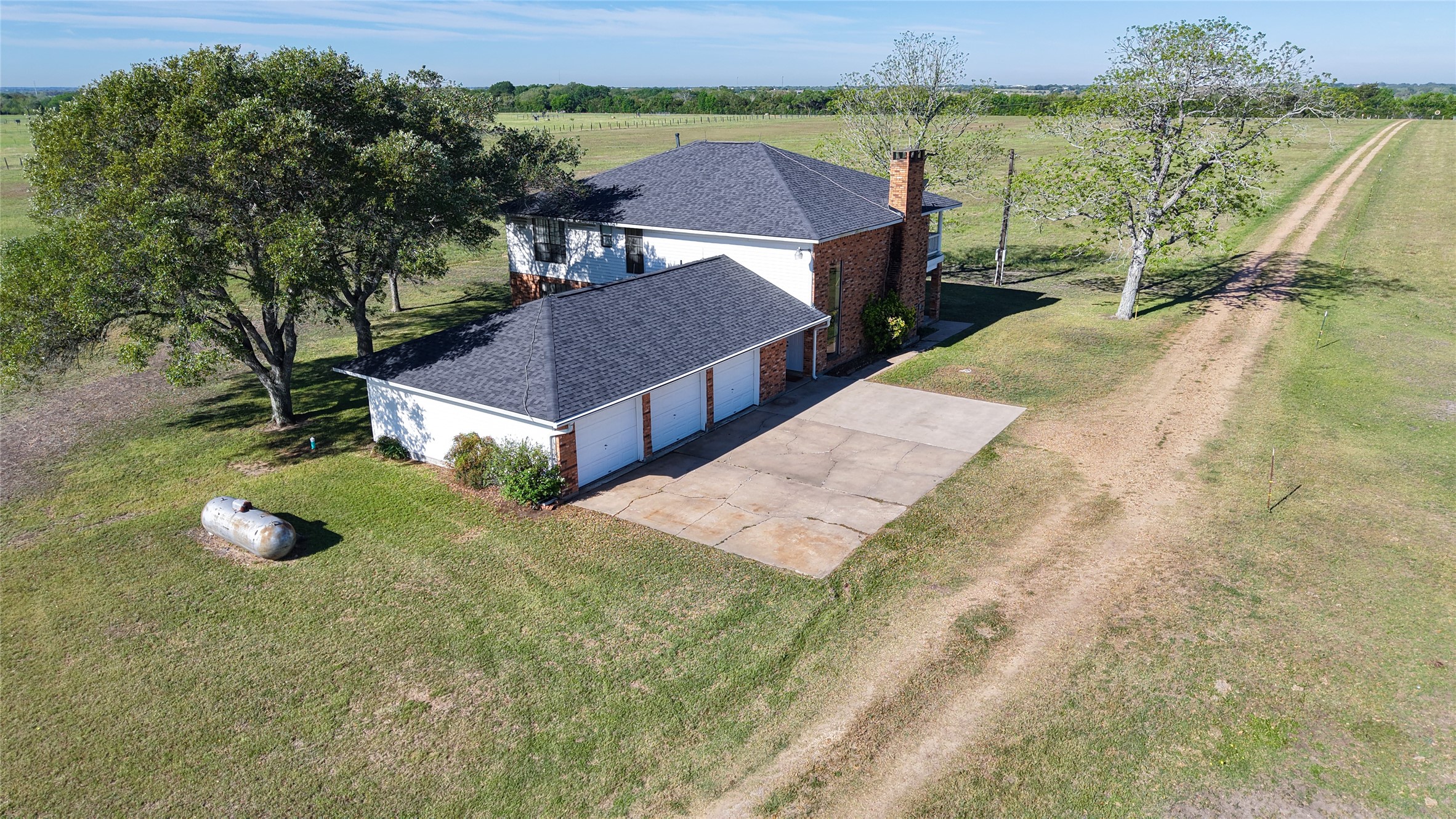 2745 Holub Road Schulenburg, TX 78956 - Photo 22 of 40 a view of a house with pool and a yard