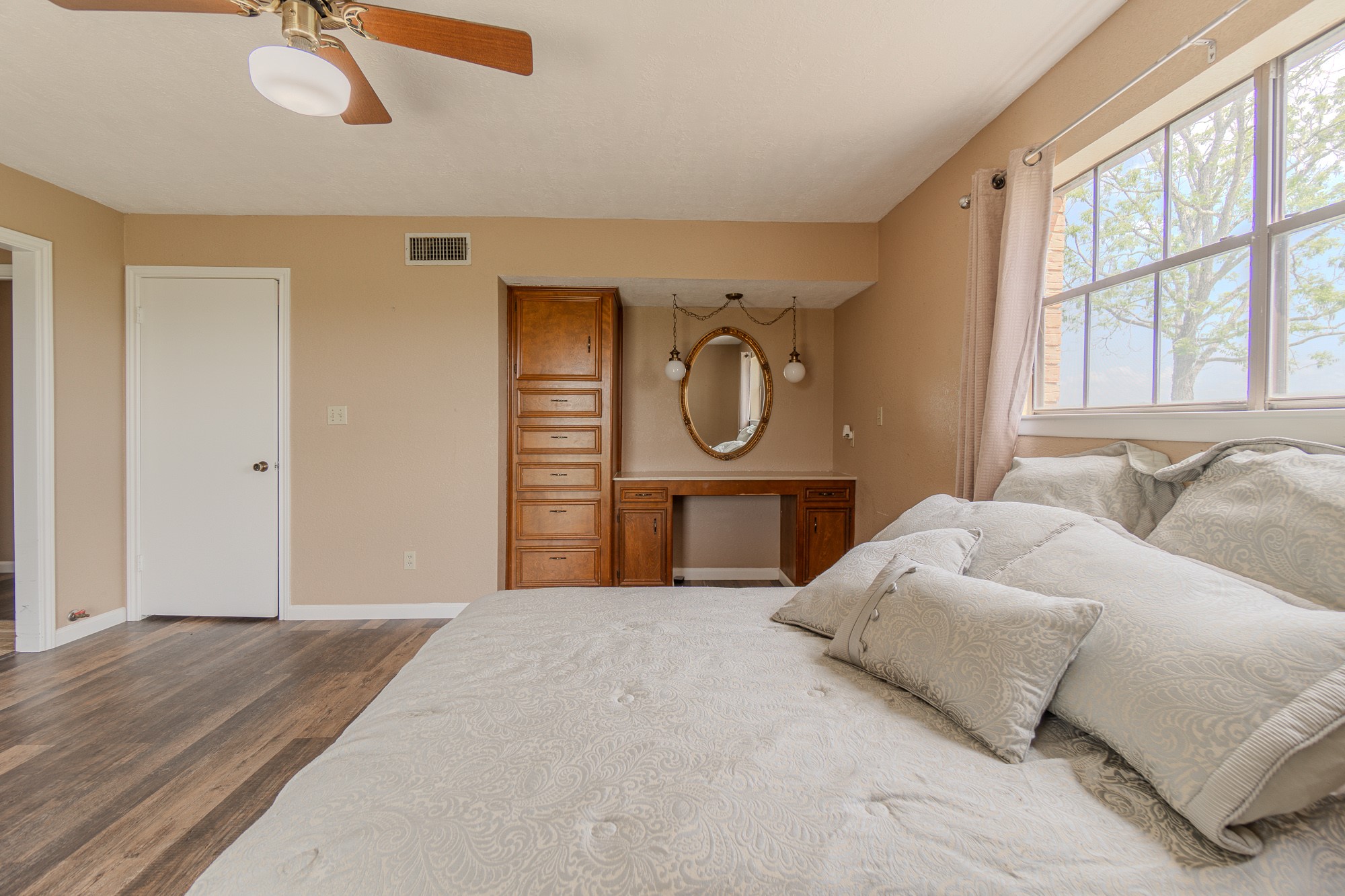 2745 Holub Road Schulenburg, TX 78956 - Photo 31 of 40 a bedroom with a bed mirror and window