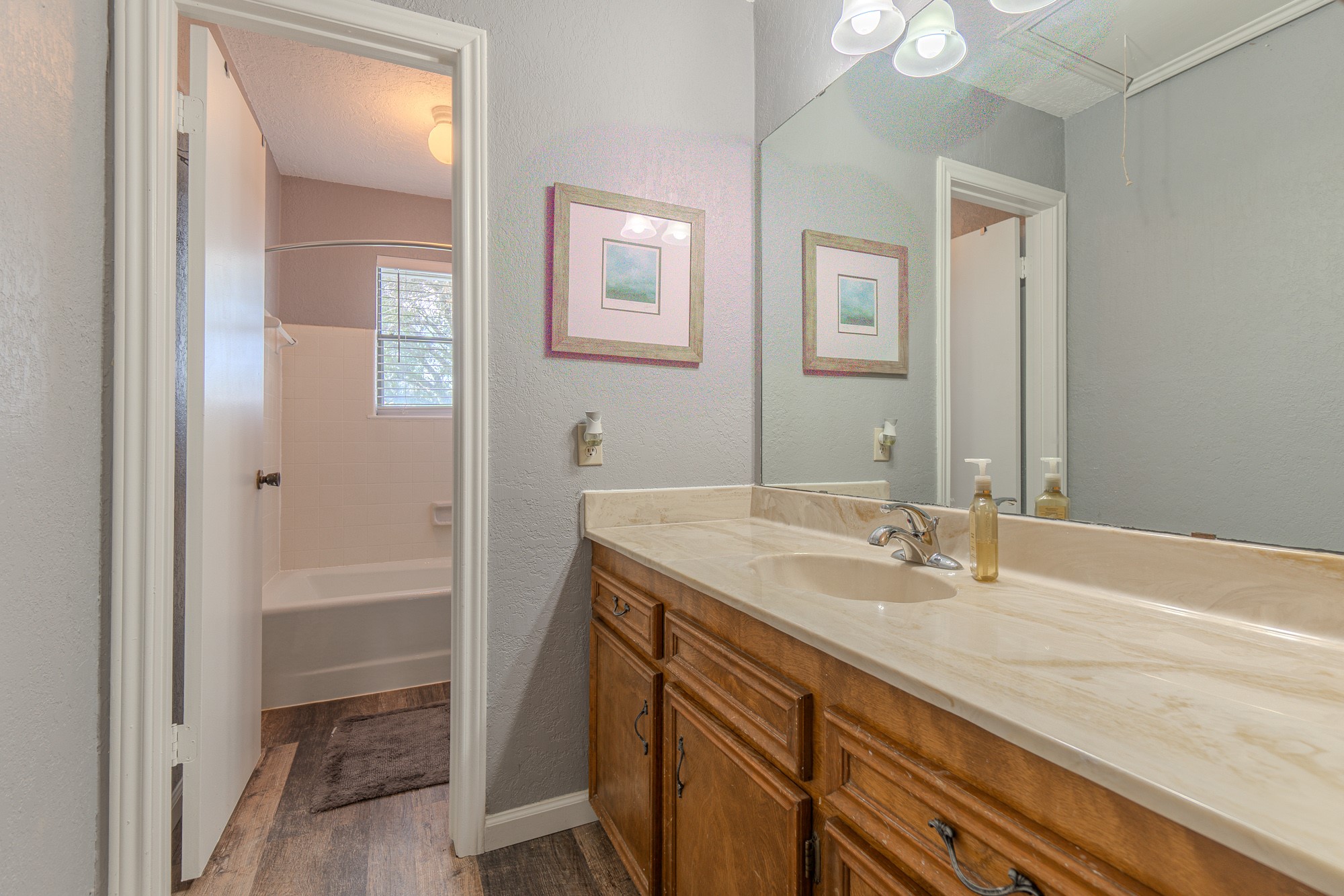 2745 Holub Road Schulenburg, TX 78956 - Photo 35 of 40 a bathroom with a granite countertop sink and a mirror