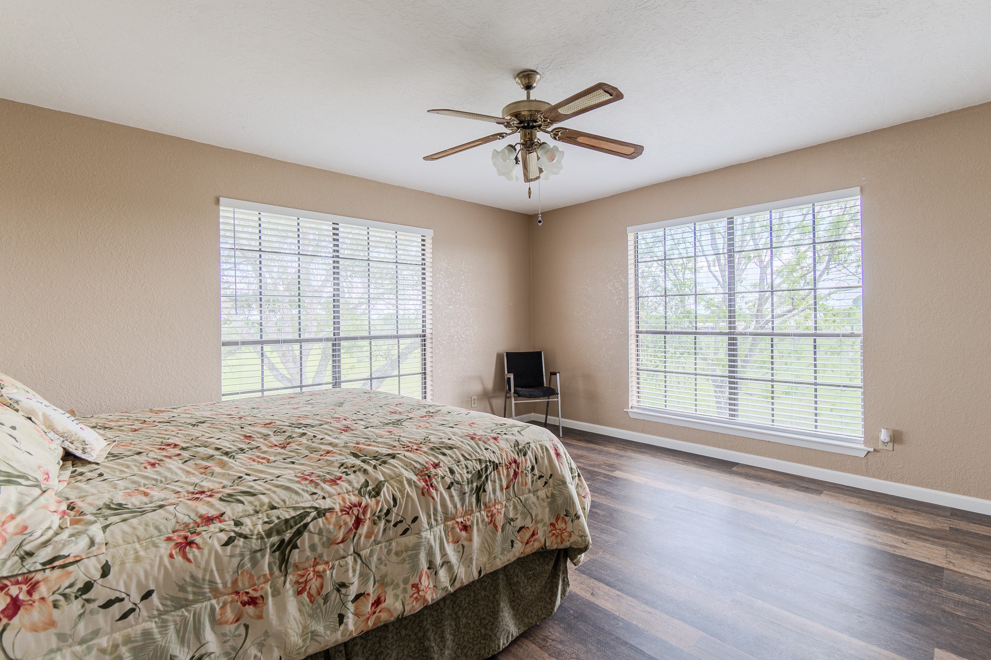 2745 Holub Road Schulenburg, TX 78956 - Photo 36 of 40 a large bed sitting in a bedroom next to a window