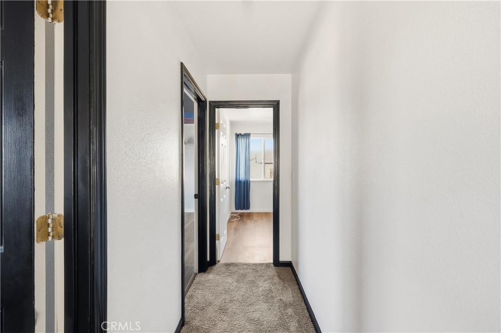 84 Jack Court Merced, CA 95341 - Photo 29 of 34 a view of a hallway with a hallway