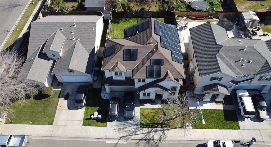 84 Jack Court Merced, CA 95341 - Photo 34 of 34 an aerial view of residential houses with outdoor space and parking