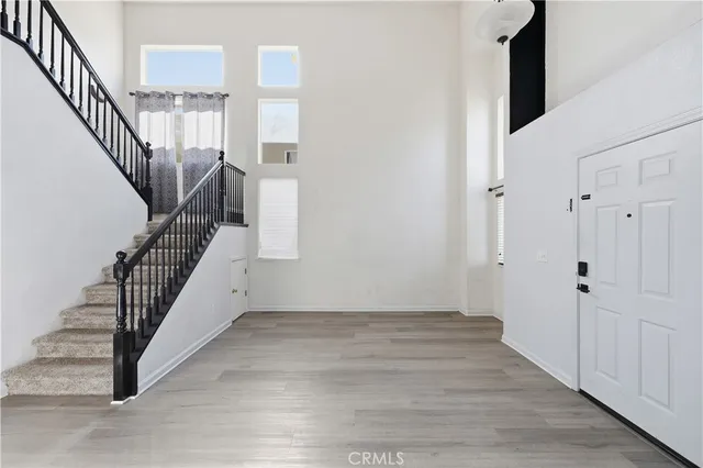 a view of entryway with wooden floor