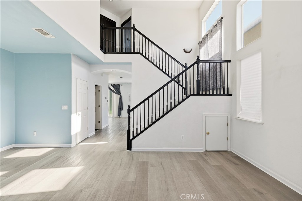84 Jack Court Merced, CA 95341 - Photo 5 of 34 a view of staircase with white walls and white walls
