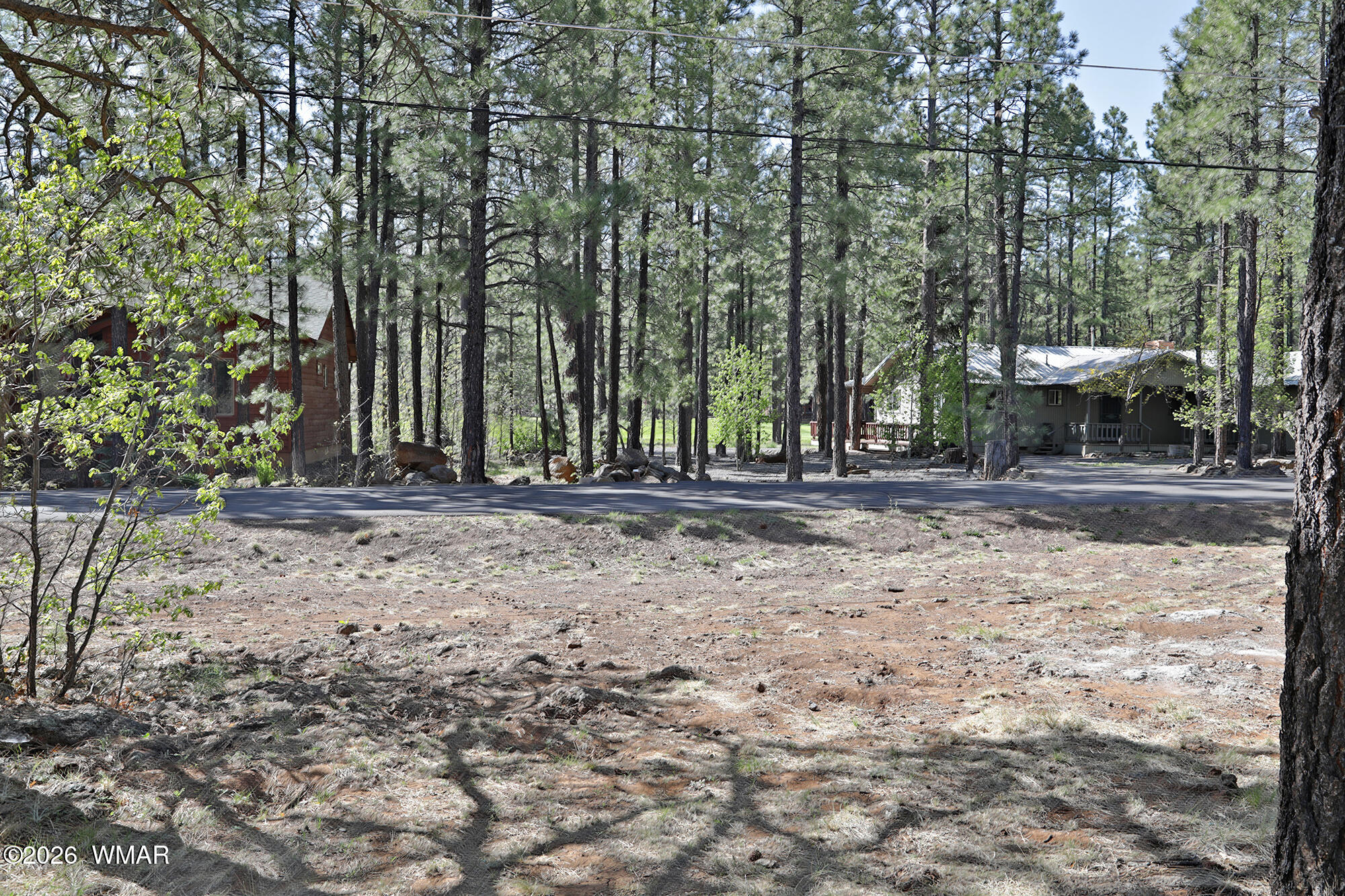 7466 Buck Springs Road Pinetop, AZ 85935 - Photo 3 of 6 a view of outdoor space with deck and trees