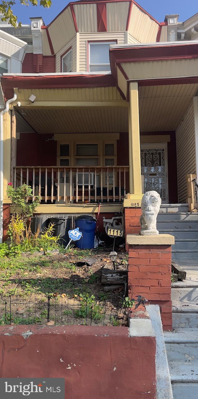1115 West Wyoming Avenue Philadelphia, PA 19140 - Photo 2 of 33 a front view of a house with large trees