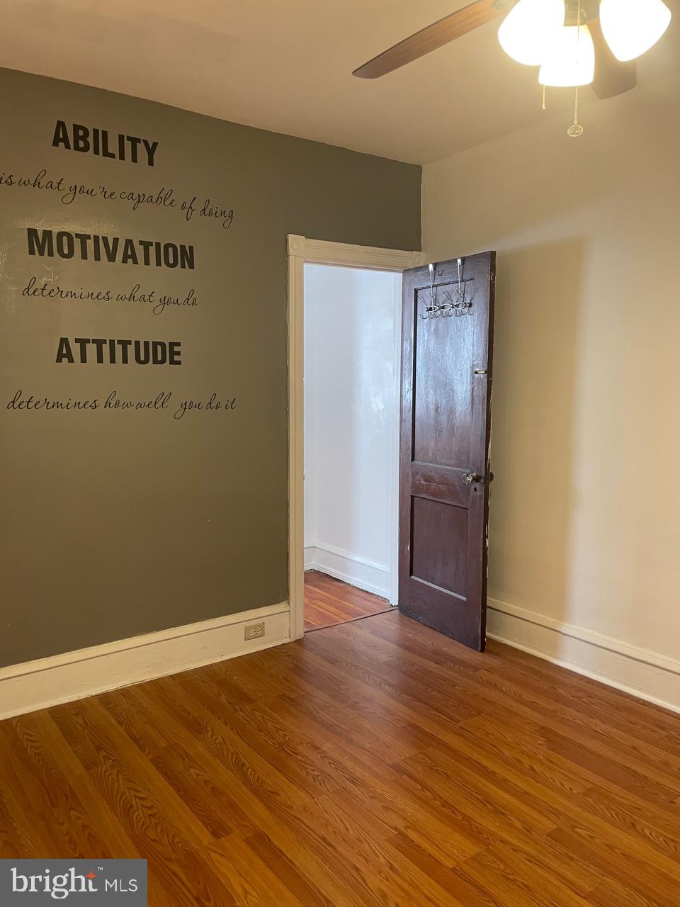 1115 West Wyoming Avenue Philadelphia, PA 19140 - Photo 26 of 33 an empty room with wooden floor and closet