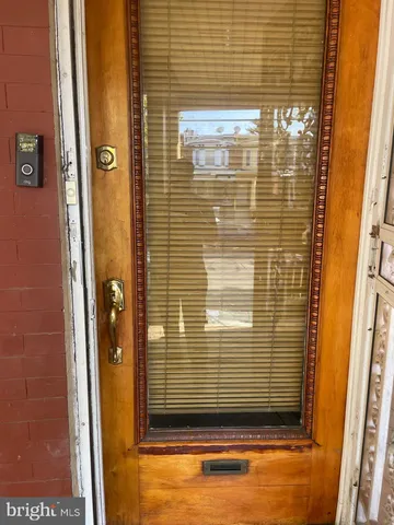 a stove top oven sitting inside of a kitchen