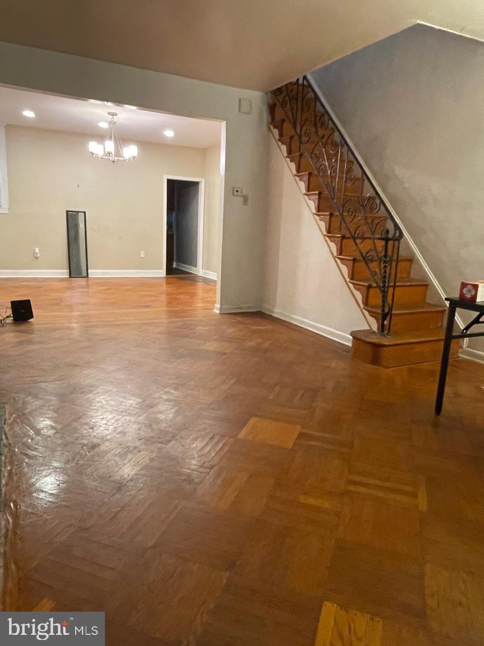 1115 West Wyoming Avenue Philadelphia, PA 19140 - Photo 6 of 33 a view of empty room with wooden floor