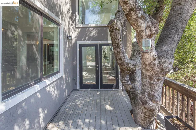 a view of a balcony with chairs