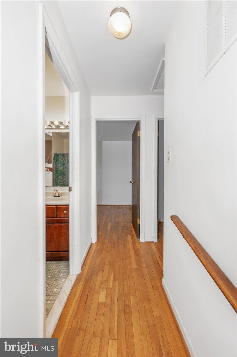 1300 Holliben Road Severna Park, MD 21146 - Photo 20 of 69 a view of a hallway view with wooden floor and staircase