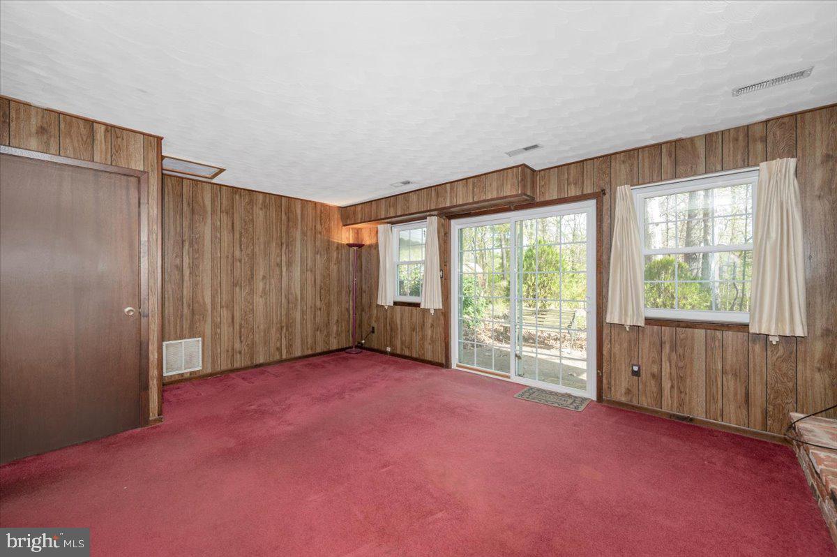1300 Holliben Road Severna Park, MD 21146 - Photo 38 of 69 an empty room with windows and view of an empty room