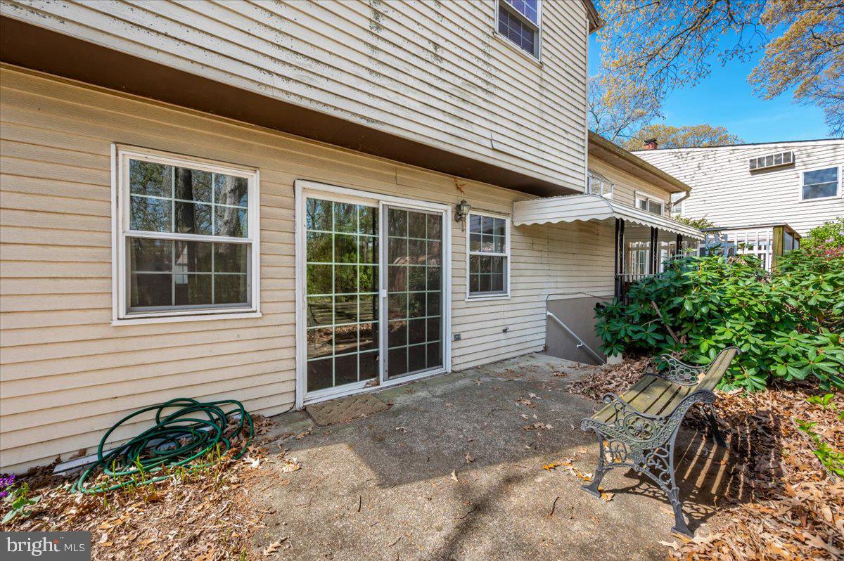 1300 Holliben Road Severna Park, MD 21146 - Photo 54 of 69 a view of a house with a yard and sitting area
