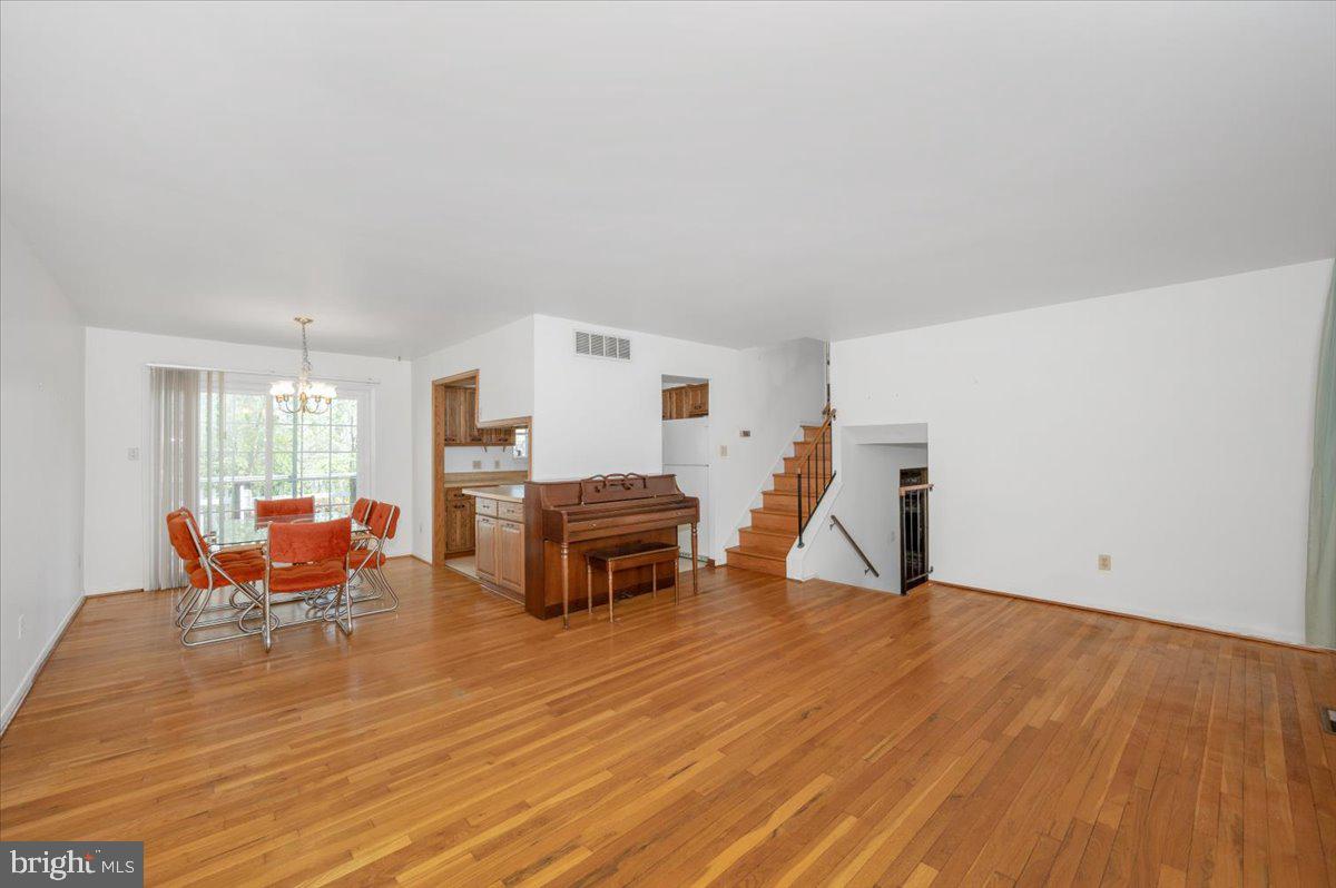 1300 Holliben Road Severna Park, MD 21146 - Photo 9 of 69 a living room with furniture and a wooden floor