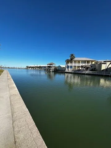 a house view with a lake view