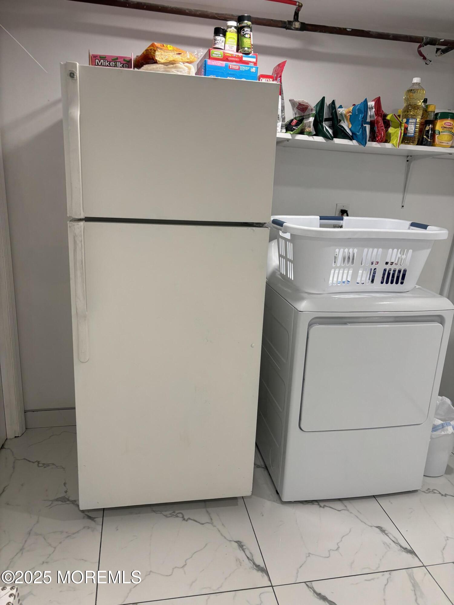 295 Roosevelt Avenue Oakhurst, NJ 07755 - Photo 11 of 16 a utility room with dryer and washer