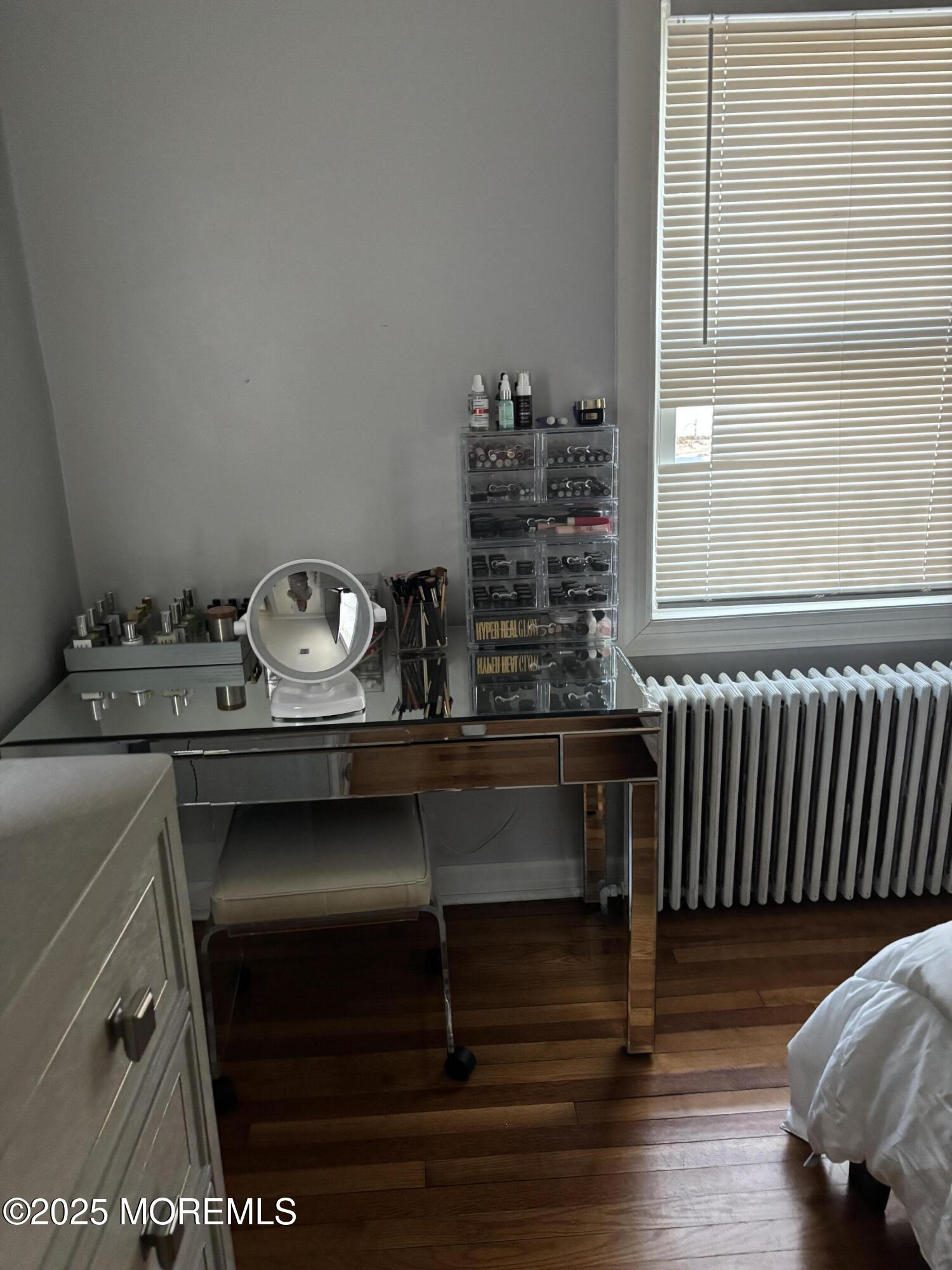 295 Roosevelt Avenue Oakhurst, NJ 07755 - Photo 12 of 16 a closeup of a table with wooden floor