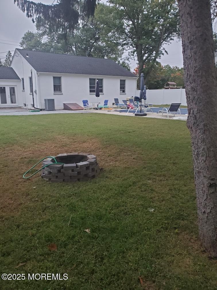 295 Roosevelt Avenue Oakhurst, NJ 07755 - Photo 16 of 16 a view of a house with a yard