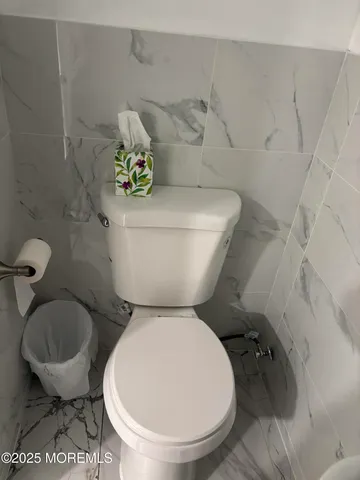 a bathroom with a sink and toilet