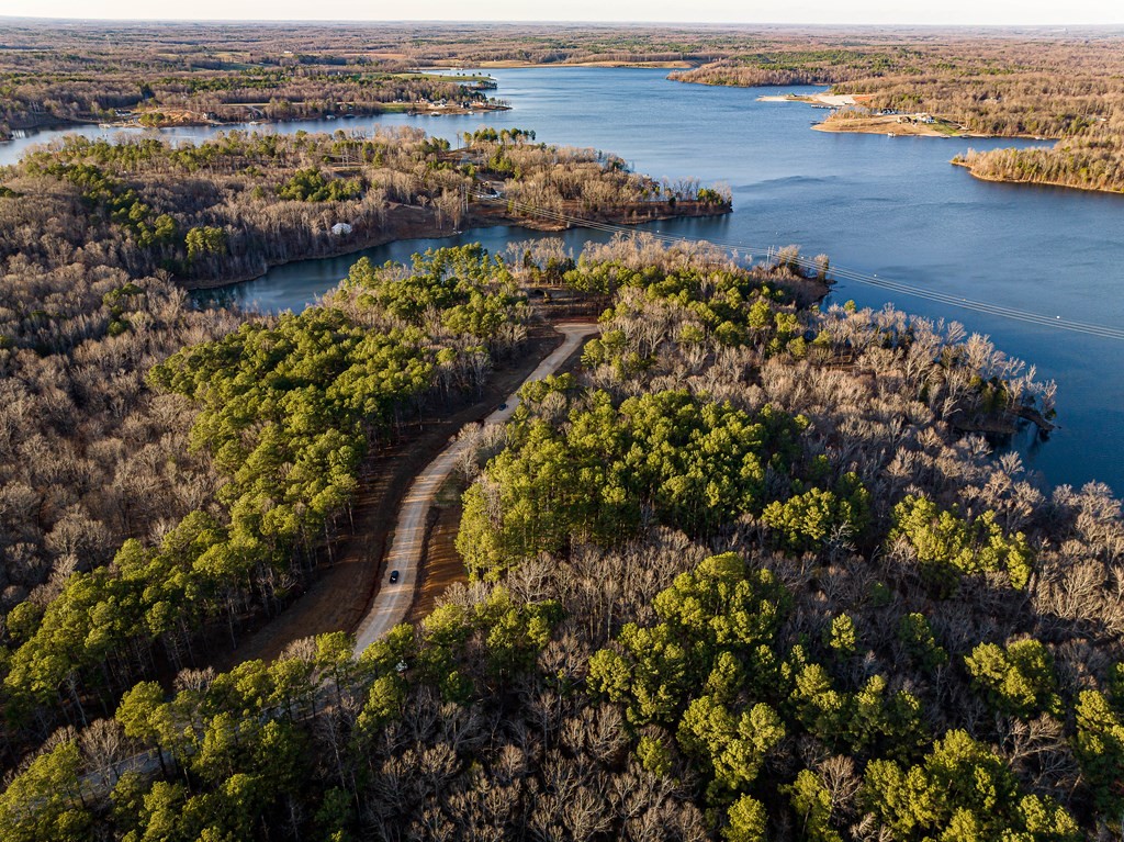 0 Stately Oak Drive Huntingdon, TN 38344 - Photo 5 of 9 an aerial view of lake and residential houses with outdoor space
