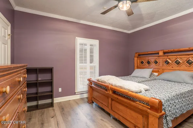 a bedroom with a bed and a closet