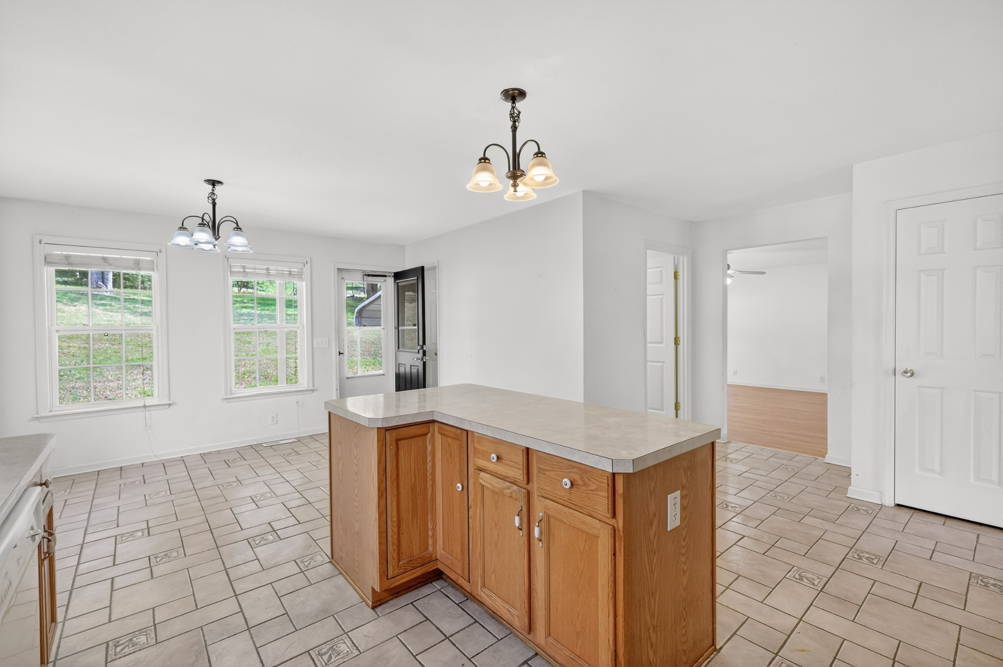 3258 Boyd Mill Avenue Franklin, TN 37064 - Photo 17 of 35 a view of kitchen with granite countertop cabinets and window