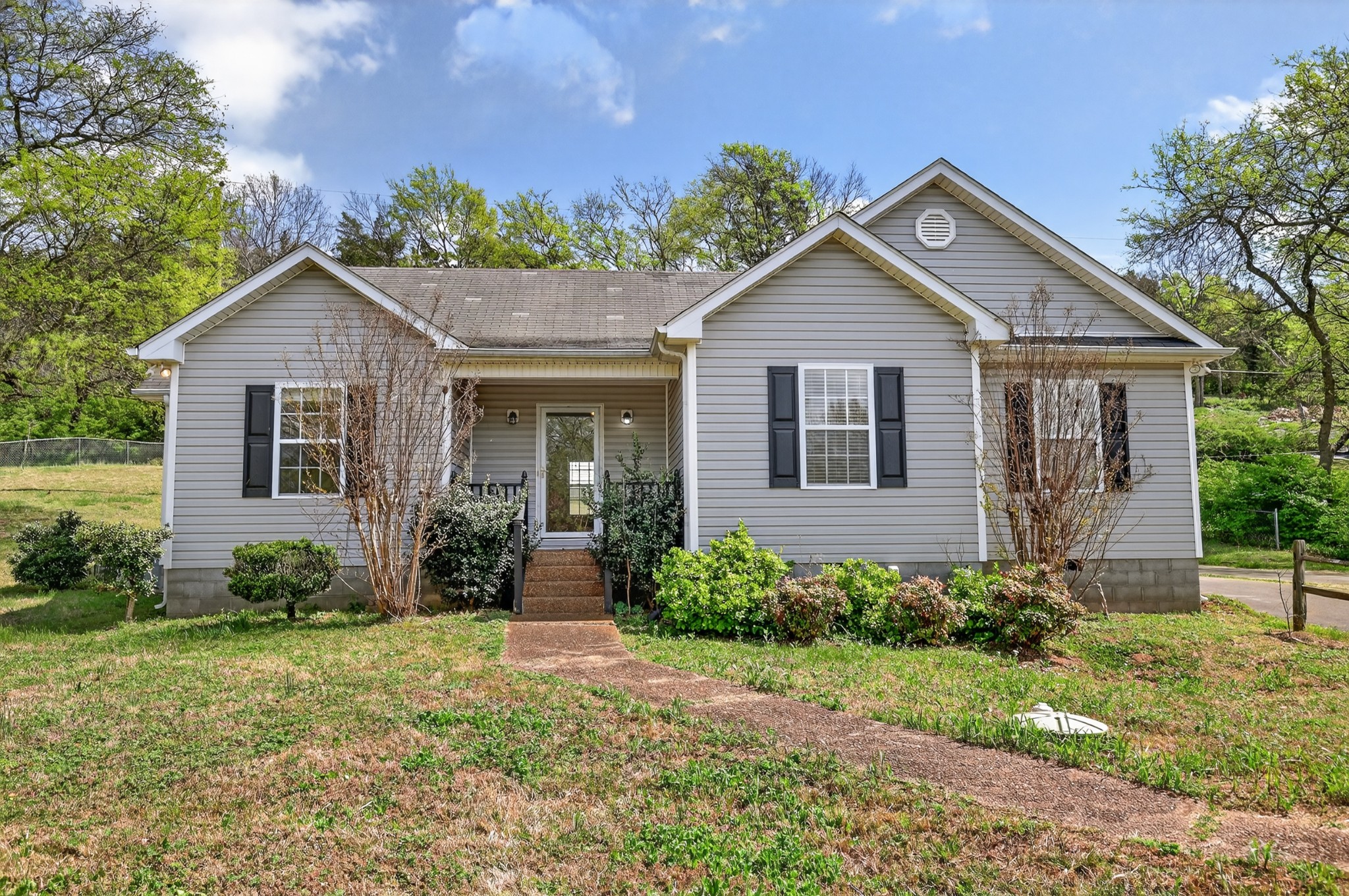 3258 Boyd Mill Avenue Franklin, TN 37064 - Photo 2 of 35 a view of a house with yard and plants