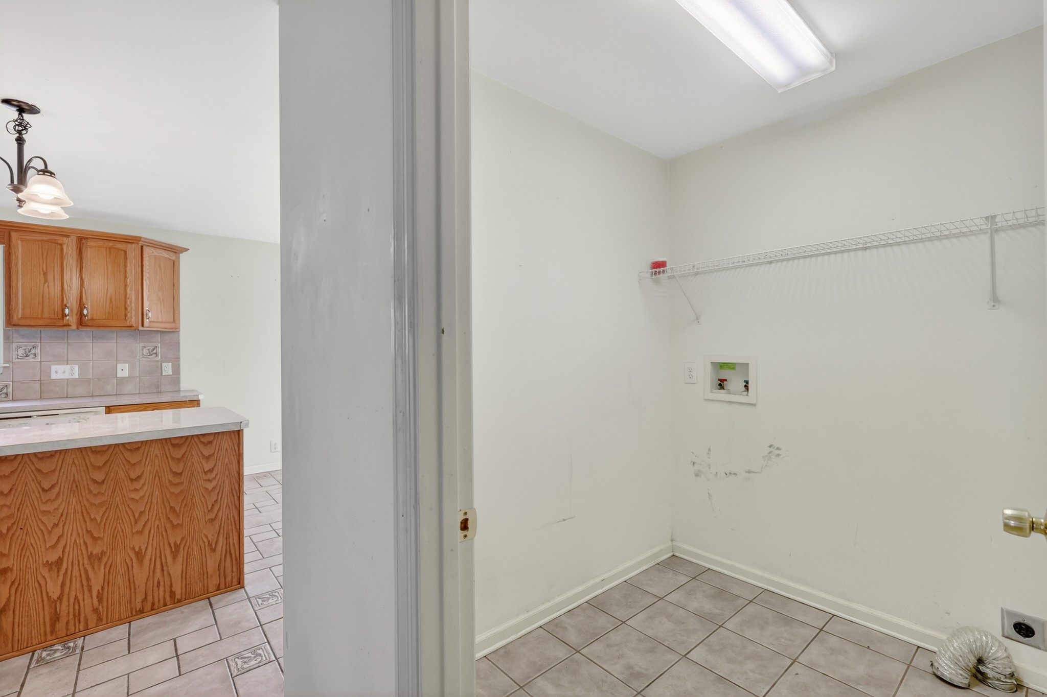 3258 Boyd Mill Avenue Franklin, TN 37064 - Photo 21 of 35 a bathroom with a granite countertop sink and white cabinets
