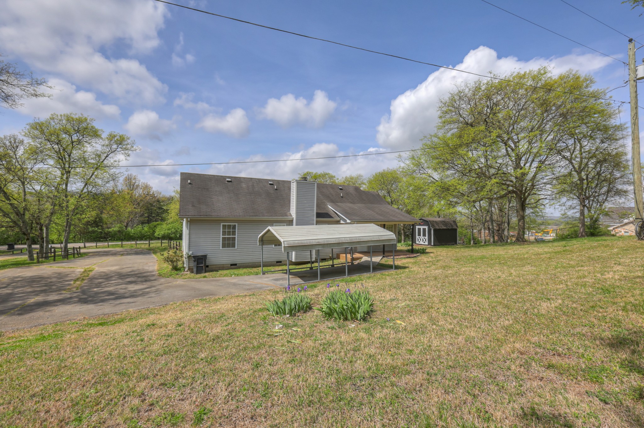 3258 Boyd Mill Avenue Franklin, TN 37064 - Photo 30 of 35 a front view of a house with a yard and garage
