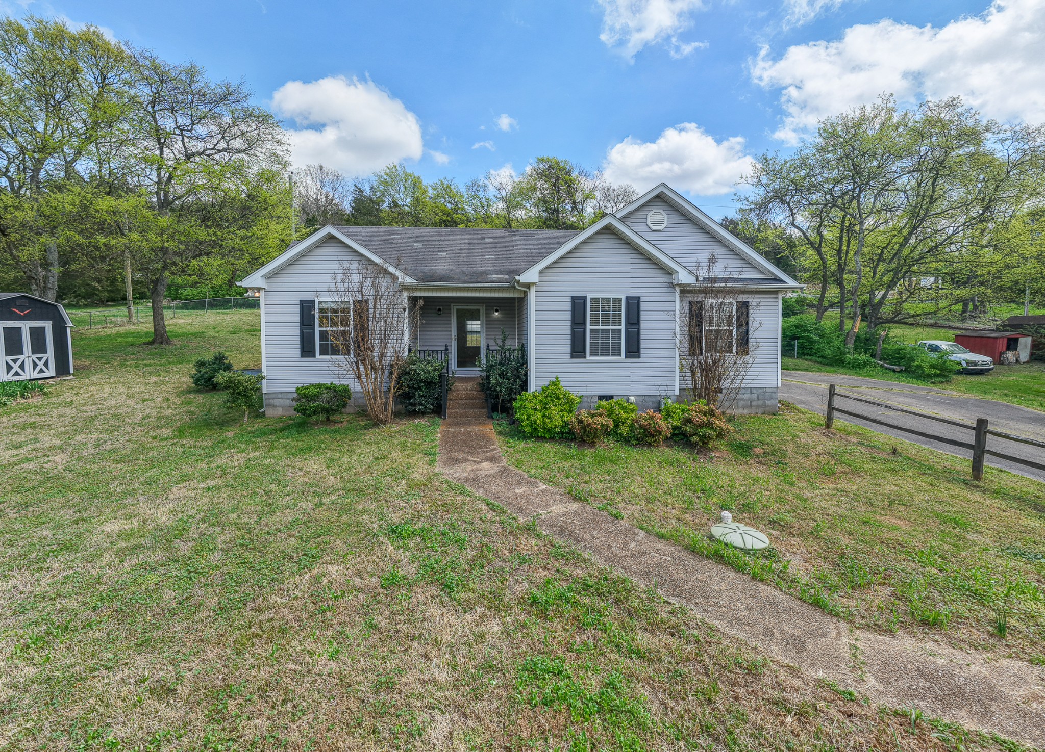 3258 Boyd Mill Avenue Franklin, TN 37064 - Photo 3 of 35 a house view with a garden space