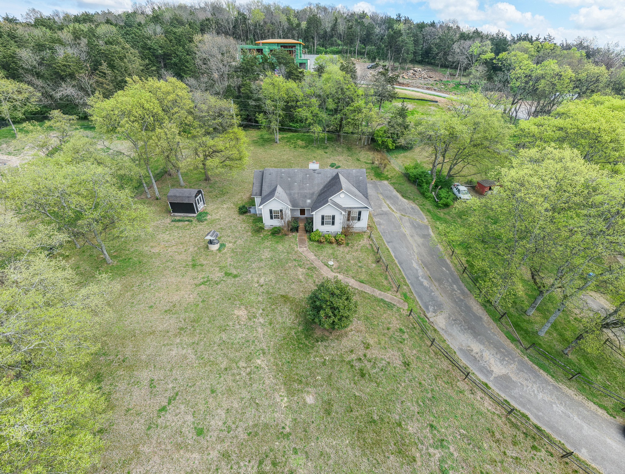 3258 Boyd Mill Avenue Franklin, TN 37064 - Photo 6 of 35 a view of a house with a yard