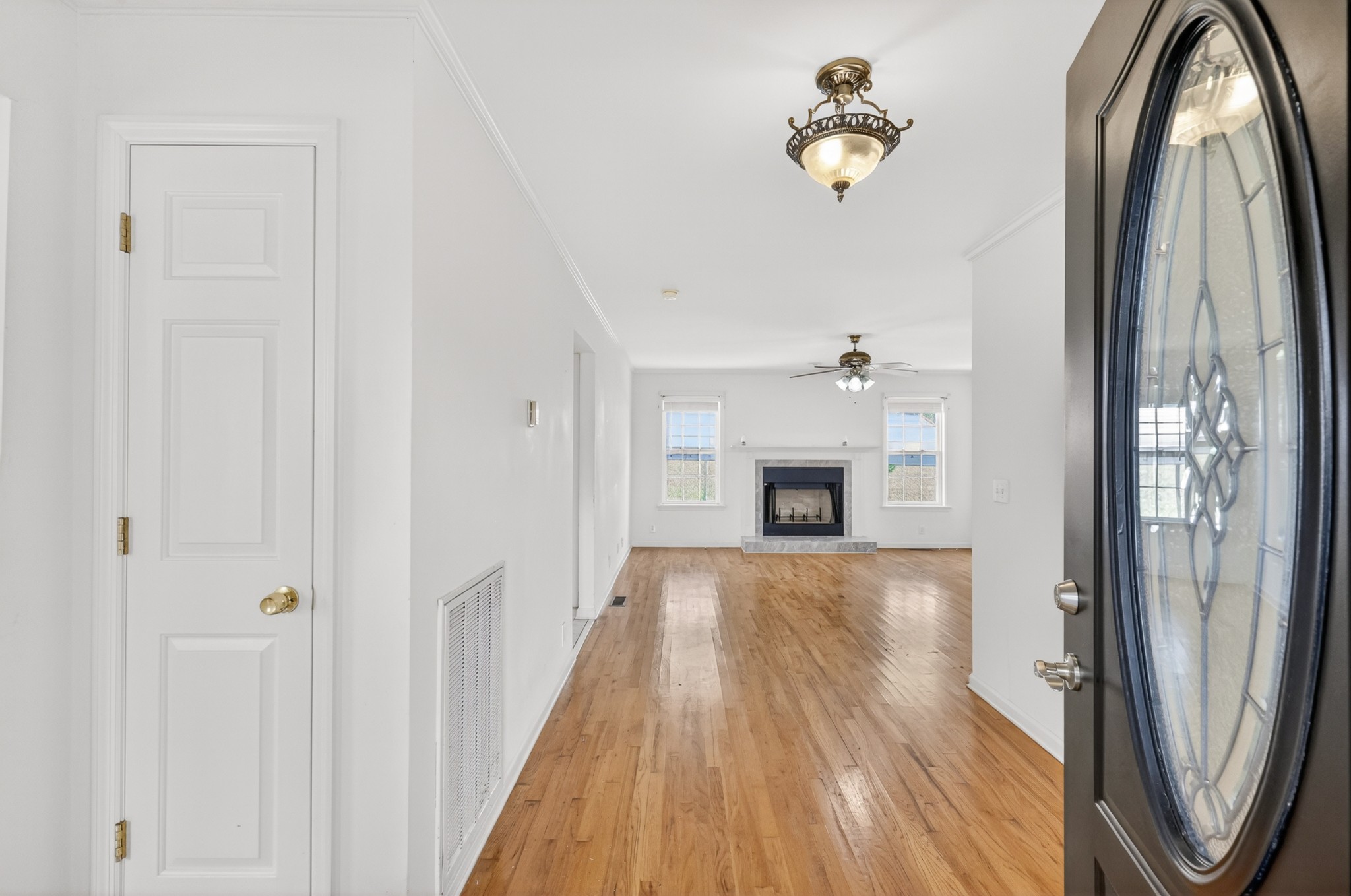 3258 Boyd Mill Avenue Franklin, TN 37064 - Photo 9 of 35 a view of a hallway with wooden floor