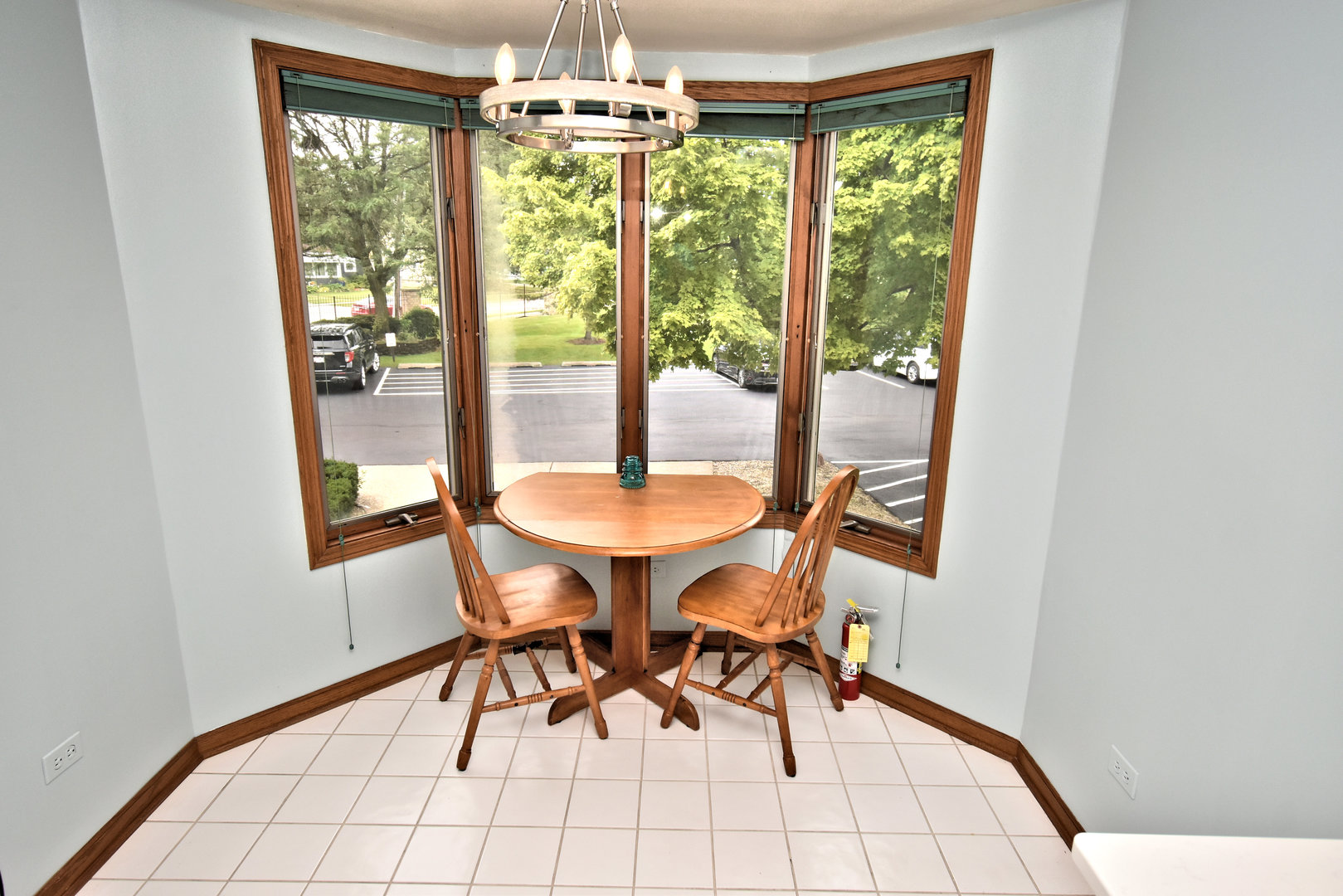 3620 186th Street, Unit 101 Lansing, IL 60438 - Photo 14 of 26 a view of a dining room with furniture window and outside view