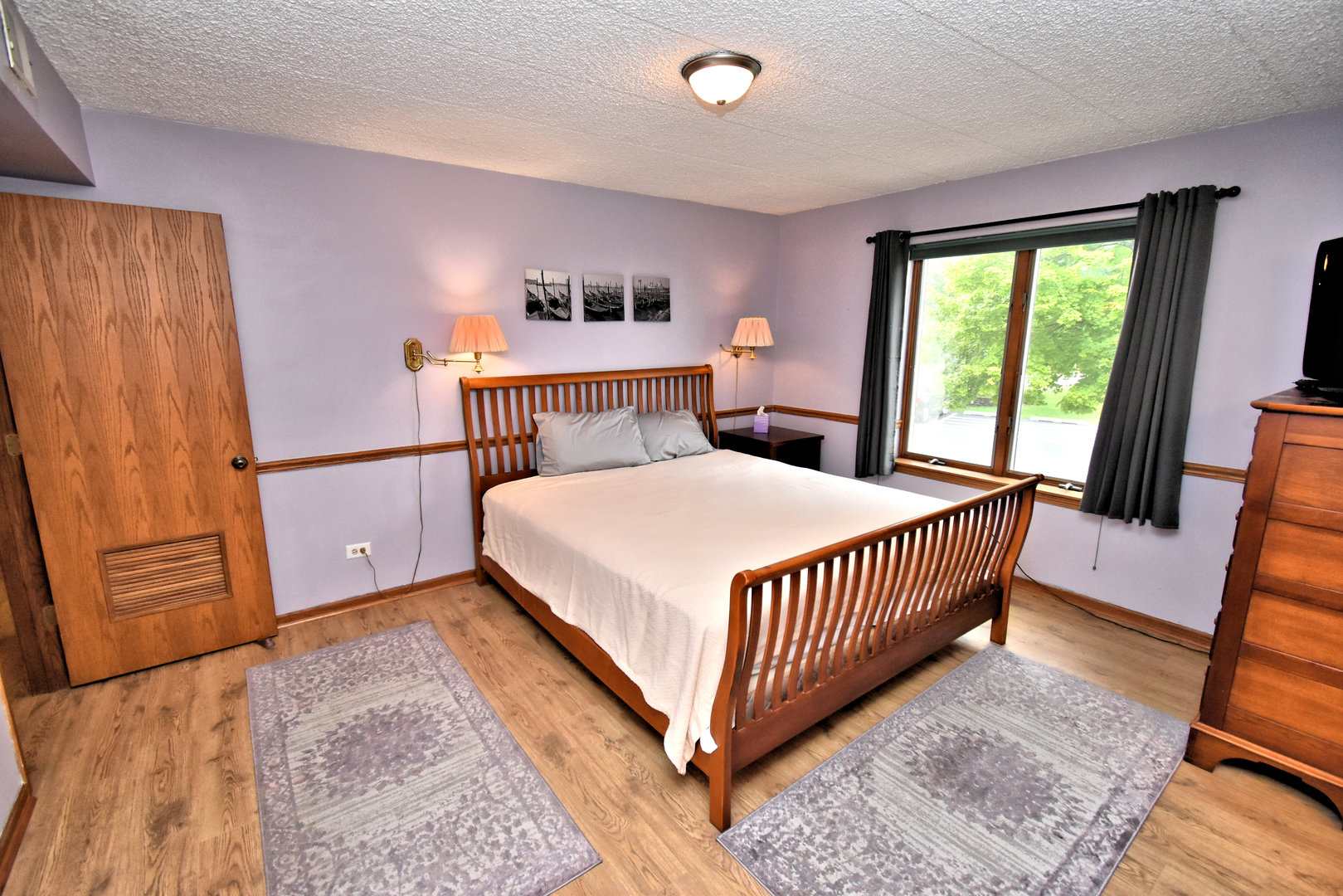 3620 186th Street, Unit 101 Lansing, IL 60438 - Photo 21 of 26 a bedroom with a bed and a window