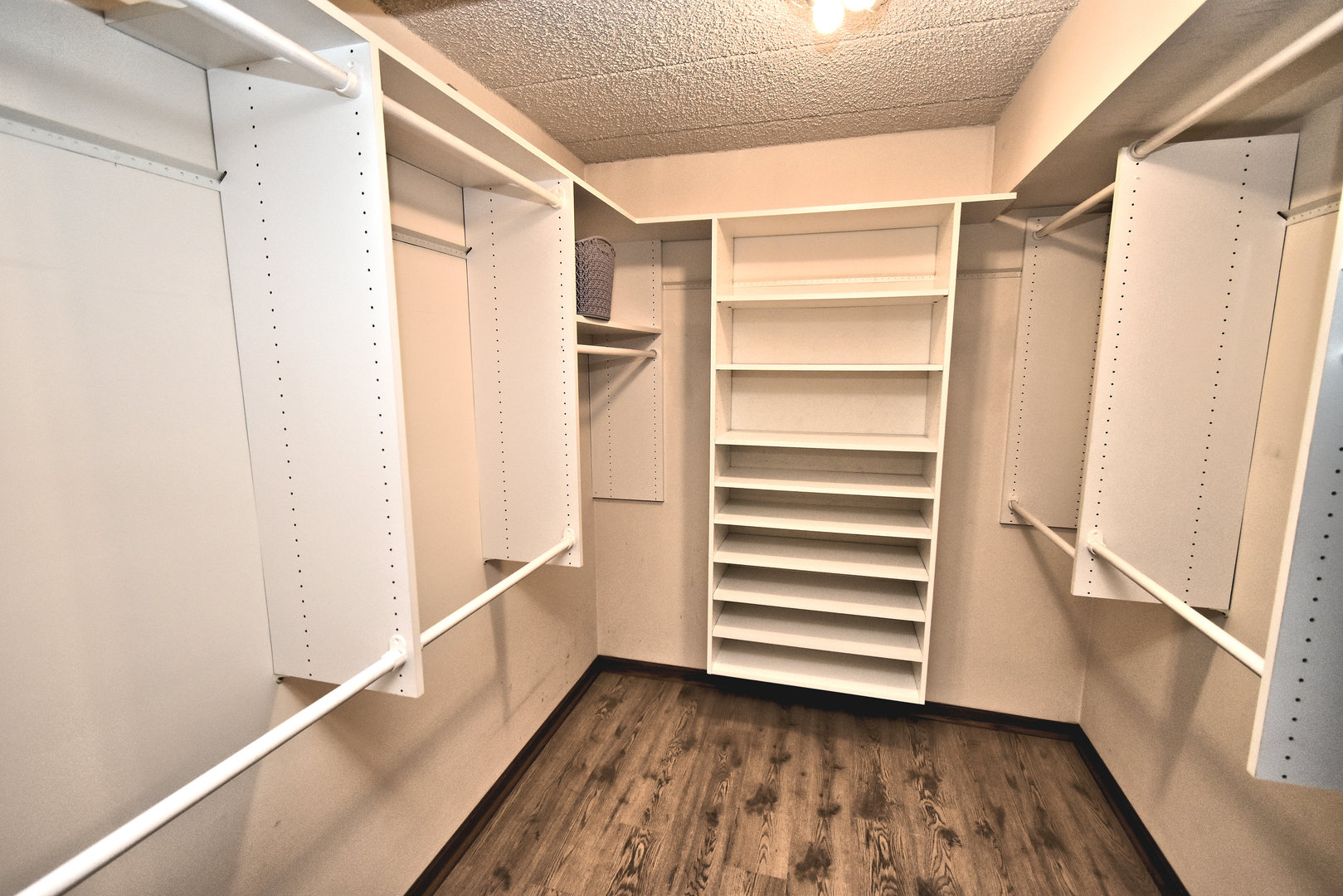 3620 186th Street, Unit 101 Lansing, IL 60438 - Photo 22 of 26 a view of walk in closet with empty racks