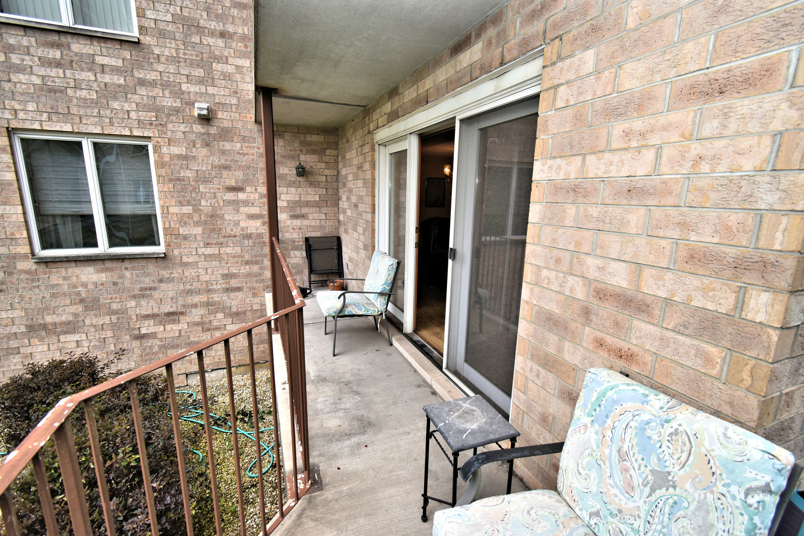 3620 186th Street, Unit 101 Lansing, IL 60438 - Photo 8 of 26 a view of balcony with furniture