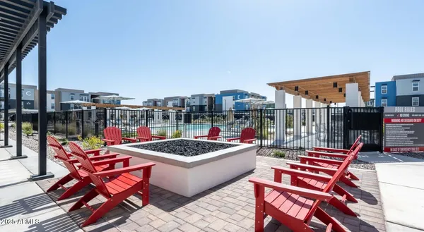 a outdoor space with lots of tables and chairs