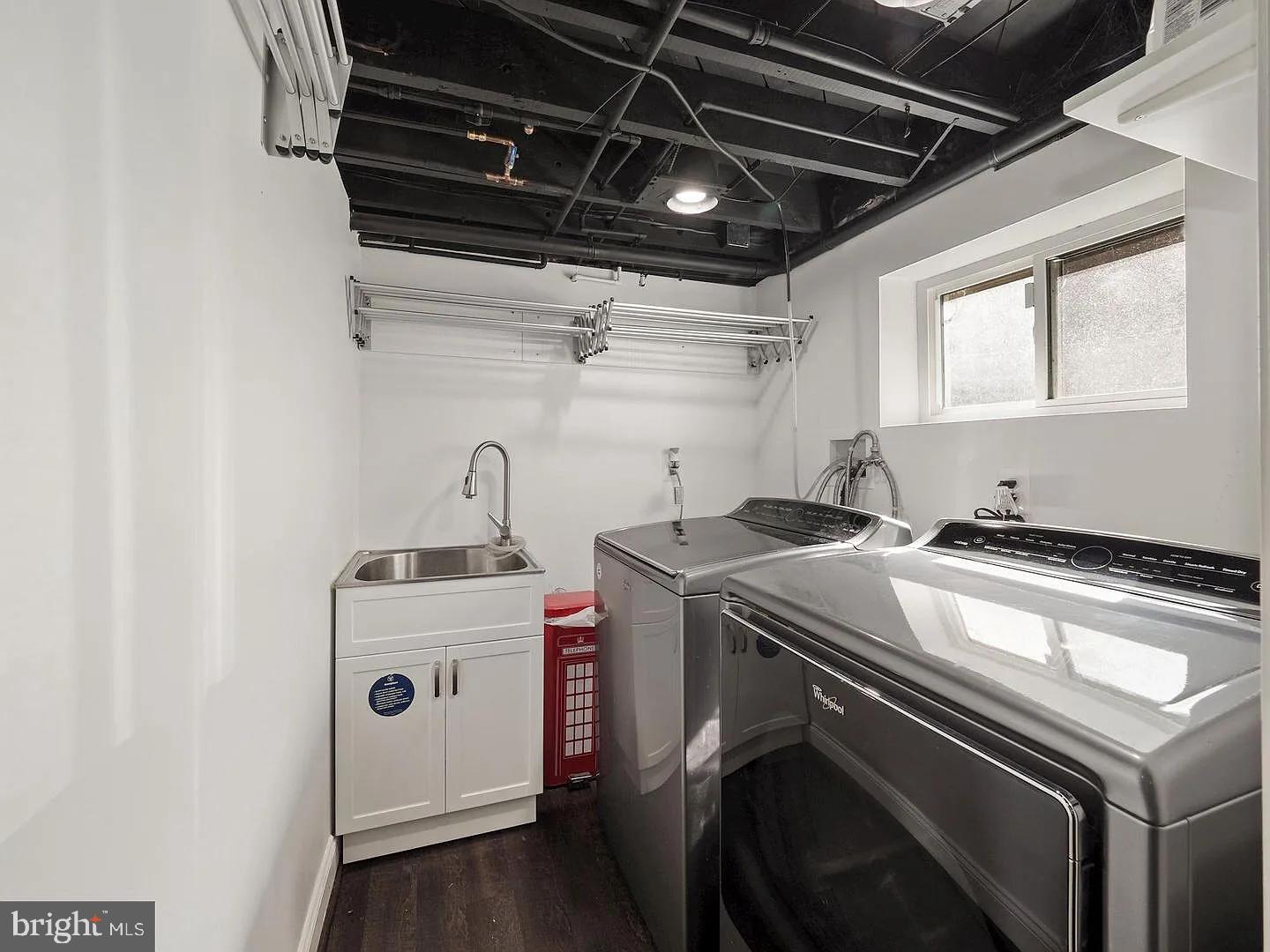 2605 Arcola Avenue Silver Spring, MD 20902 - Photo 25 of 30 Modern laundry space with natural light.