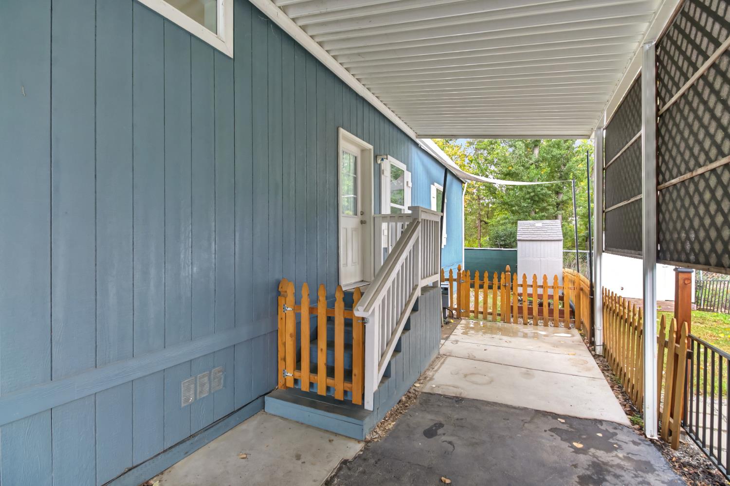 9060 Auburn Folsom Road, Unit 7 Granite Bay, CA 95746 - Photo 20 of 22 a view of a house with a porch