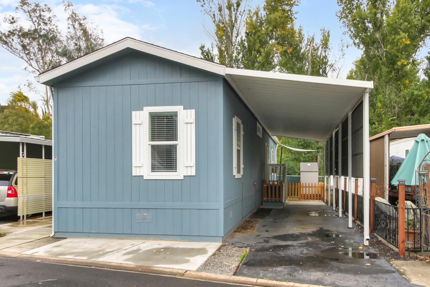 9060 Auburn Folsom Road, Unit 7 Granite Bay, CA 95746 - Photo 21 of 22 a view of a house with a outdoor space