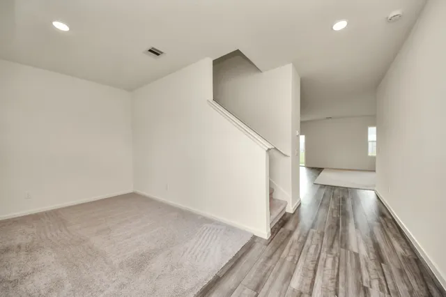 a view of entryway with wooden floor
