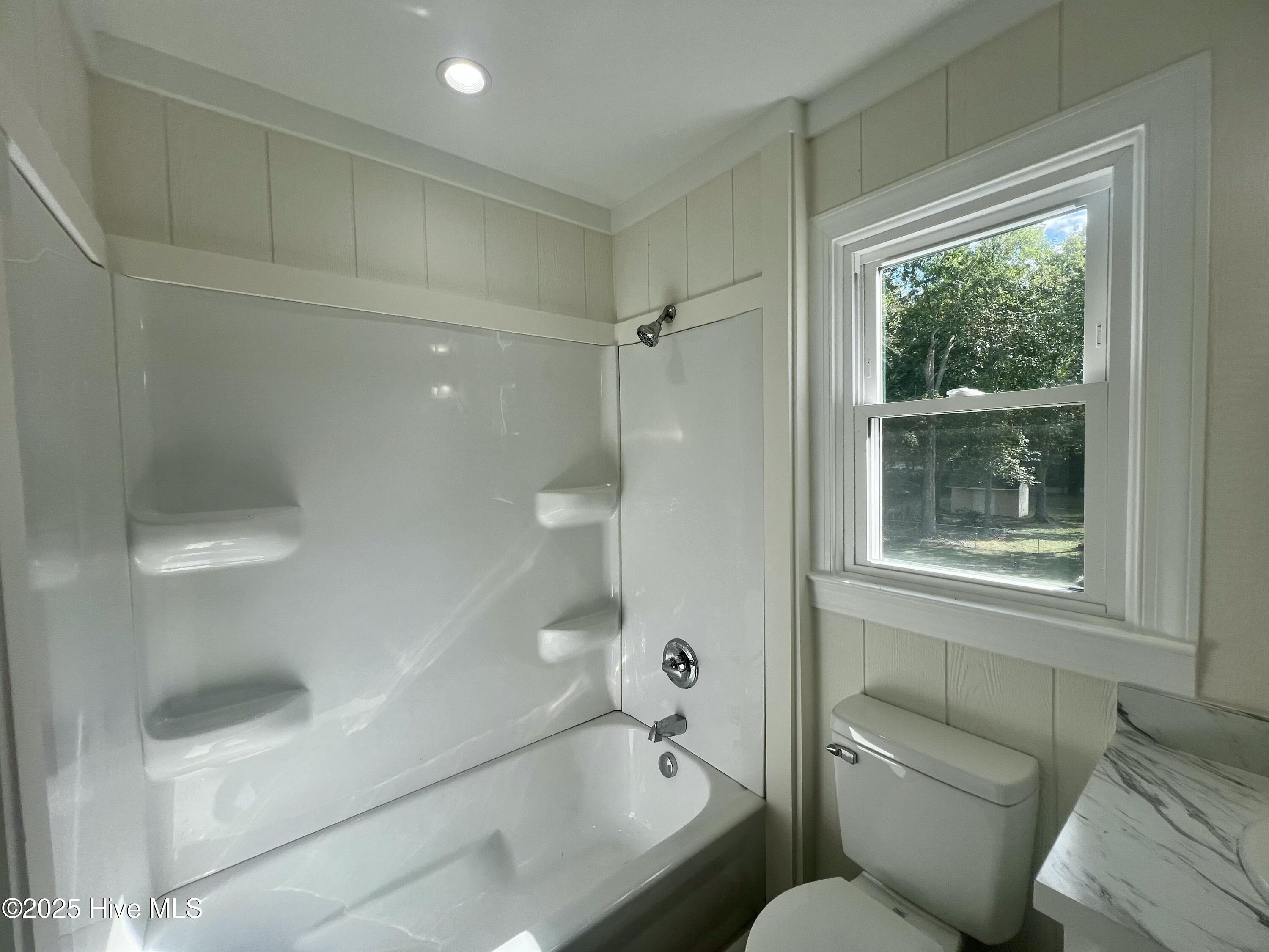 2443 Creekside Road Kinston, NC 28504 - Photo 33 of 41 All new shower, toilet, vanity, and lighting