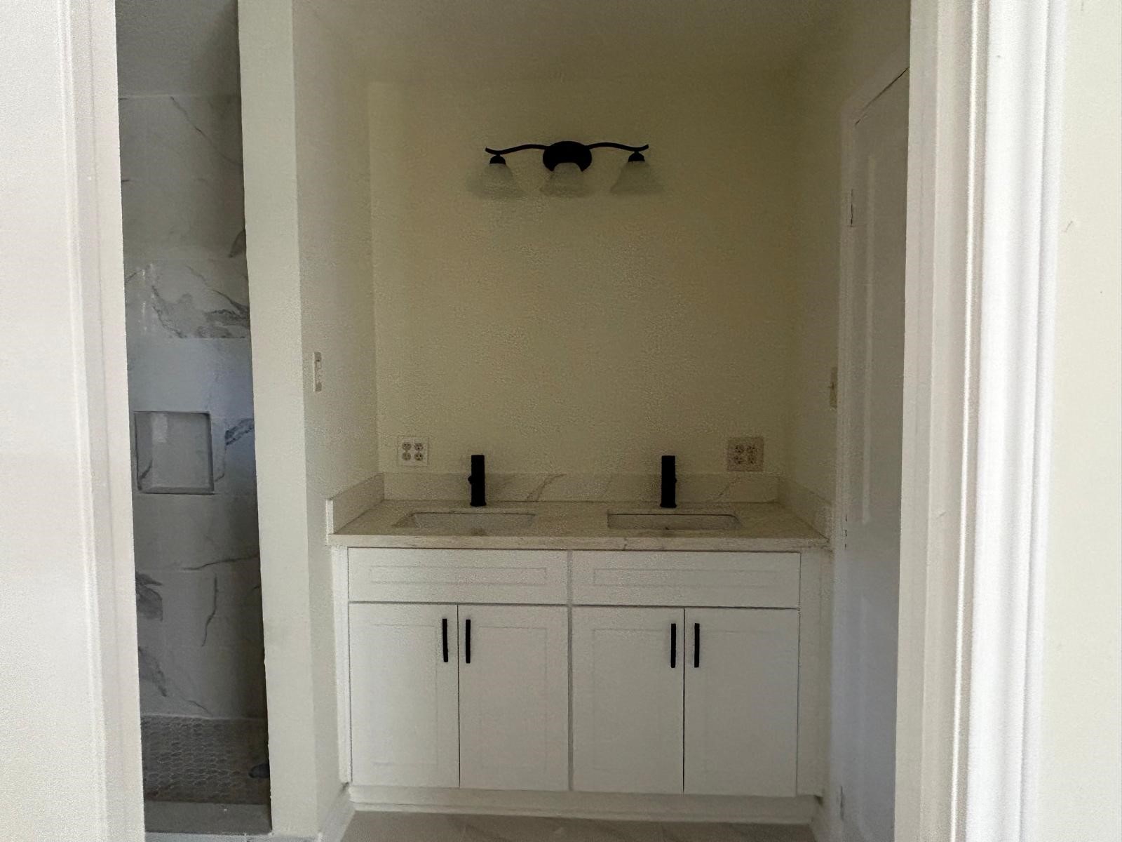 23026 Cranberry Trail Spring, TX 77373 - Photo 12 of 15 a bathroom with a granite countertop sink vanity and mirror