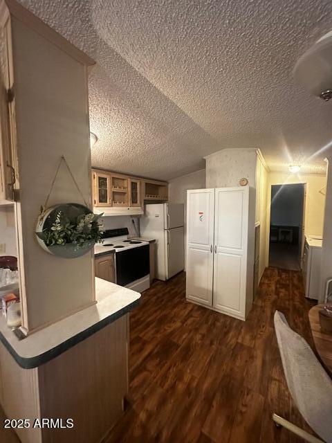 2121 North Center Street, Unit 120 Mesa, AZ 85201 - Photo 11 of 34 a kitchen with cabinets and wooden floor