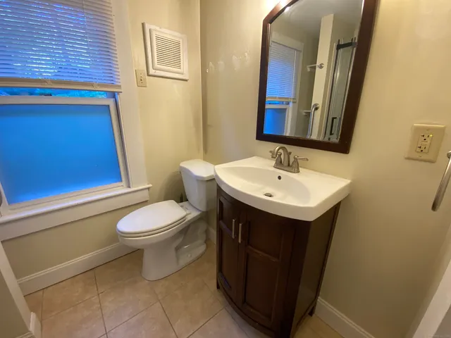 a bathroom with a sink and a toilet